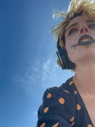 The Lily Robinsons - headphones and dark lipstick